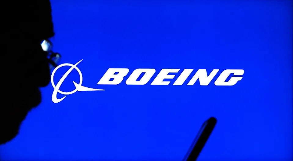 Top Stock Movers Now: Boeing, DuPont, Tesla, and More