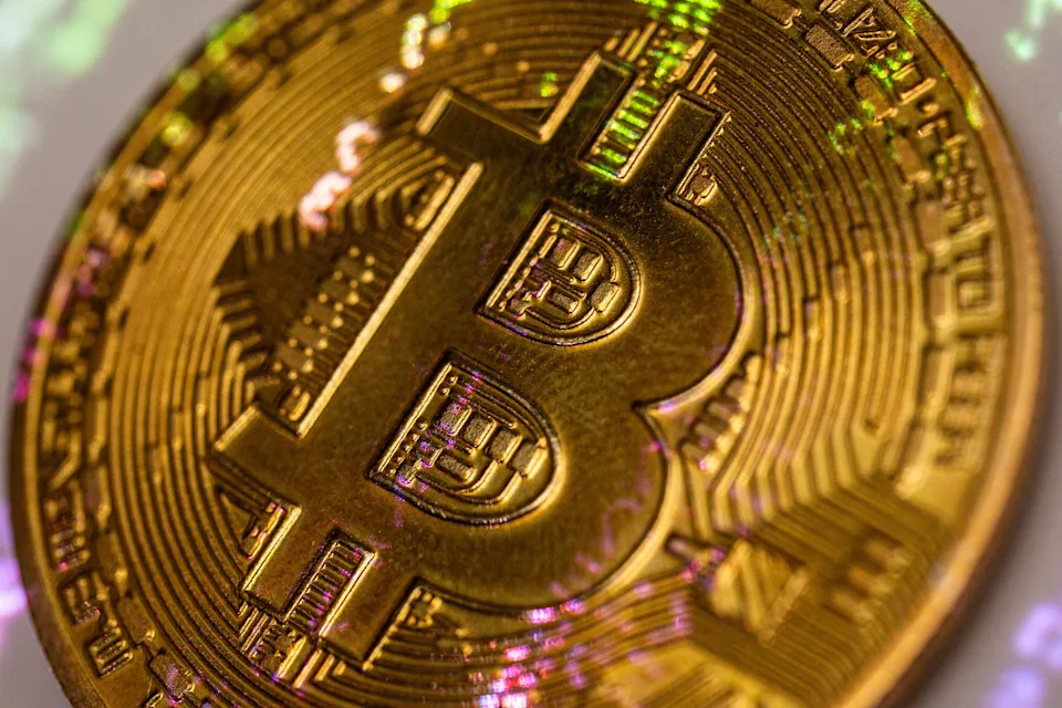 Bitcoin sinks below $80,000 in line with stocks, but may prove more resilient